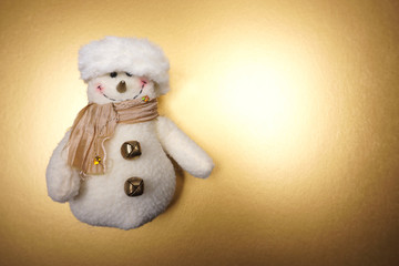 Greeting card with, snowman. Cute holiday cartoon character at golden luxury background with copy...