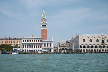 Fototapeta na wymiar Venice, Italy - July 02, 2019 : View of Piazza San Marco and palazzo Ducale from the ferry boat