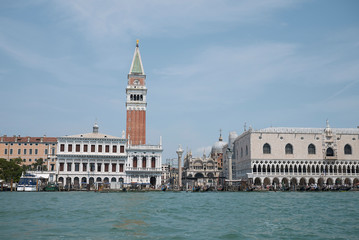 Fototapeta na wymiar Venice, Italy - July 02, 2019 : View of Piazza San Marco and palazzo Ducale from the ferry boat