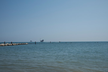 Lido di Dante, August 06, 2019 : View of Lido di Dante stone pier and platforms for the extraction...