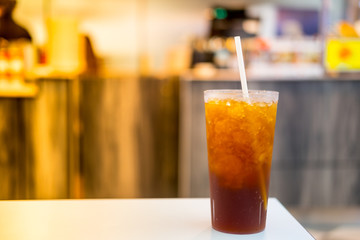 Iced lemon tea in a glass on the table
