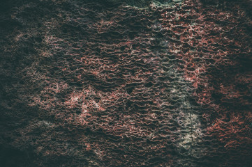 Old brown wall backround. Grunge wave texture, darked and vingette