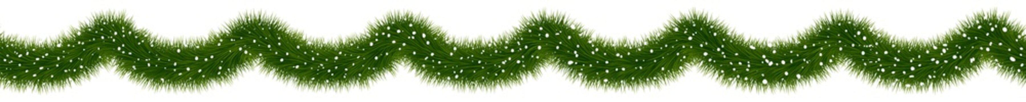 Festive Christmas fir garland covered with snow.