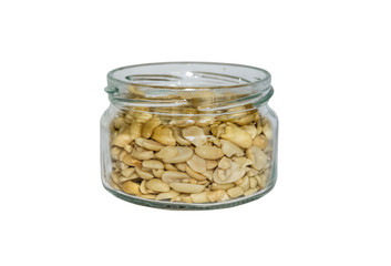 salted peanuts in a jar on a white background.