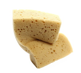 Yellow crumpled sponge for cleaning isolated on white background, clipping path