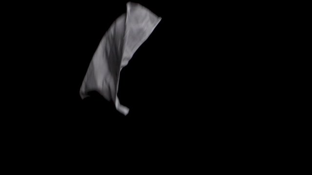 White Disposable Paper Handkerchiefs Falling down, black background Close Up Slow Motion Shot, depression, cold or sadness concept