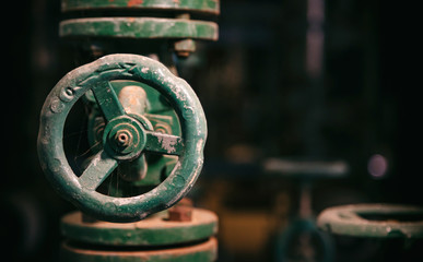 Industrial pipeline and valve close up, blur background