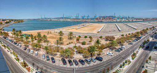 Algeciras, Cadiz, Spain - August 10, 2019: Panoramic view of the sea port of Algeciras, Spain, with the Rock of Gibraltar in the background