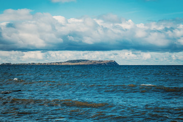 Fototapeta na wymiar Small island across the Baltic Sea