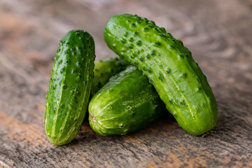 Cucumber sliced on the cutting board, salad ingredient, fresh cucumbers on a table.