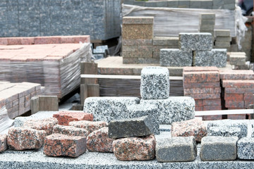 Granite stones are sold in construction market. Construction Materials. Building materials for decoration and construction. Close up.