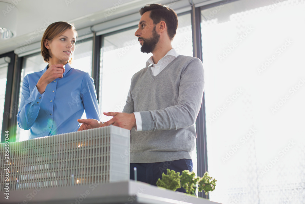 Wall mural business colleagues planning new building structure in office