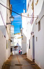 Fototapeta na wymiar Narrow town street on the Costa del Sol