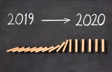 New Year Business Concept. 2020 Approaching, on Blackboard