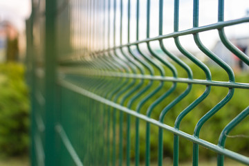 Green sectional steel fence