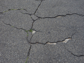 Obraz premium cracked tarmac texture background
