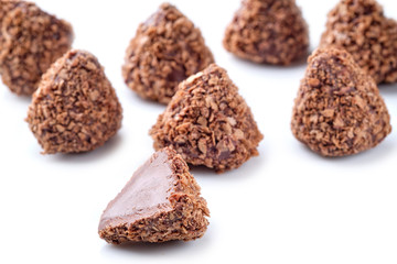 Chocolate truffles on a white background