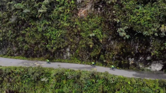 Aerial shot of bicyclists bikers on the La Paz Death Road in Bolivia.