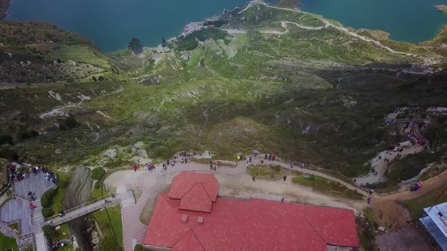 Aerial shot reveals Quilotoa, Ecuador caldera in the Andes Mountains.