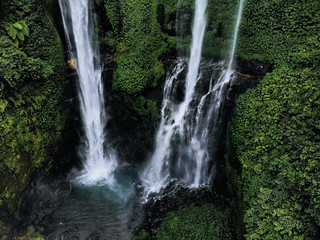 Obraz premium Aerial view of Sekumpul waterfall on Bali island Indonesia - travel and nature background. Drone photo