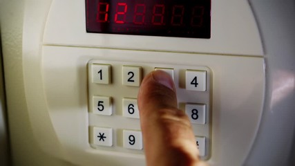 Safe in the hotel closet. Close-up shot.