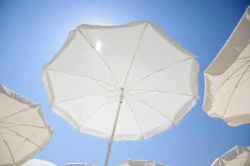 Wide angle view of beach umbrella sunny day