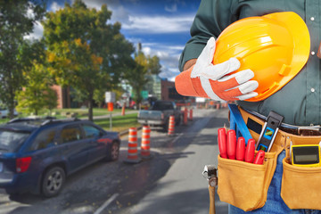 Mature worker and road repair