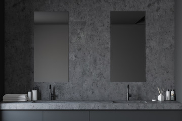 Close up of gray and stone bathroom sink