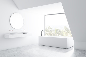 White bathroom corner with sink and tub