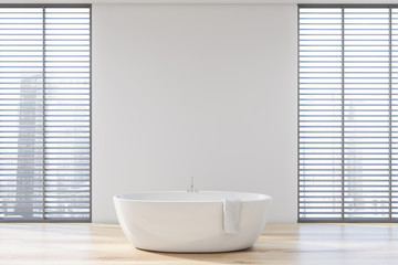Fototapeta na wymiar White bathroom interior with white tub