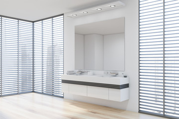White bathroom corner with double sink and blinds