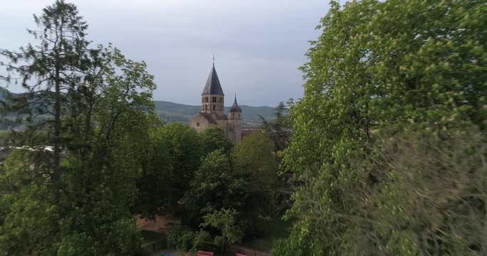 Aerial back traveling over Cluny, France
