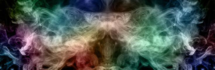 Abstract colorful smoke on black background from the incense sticks, panoramic image
