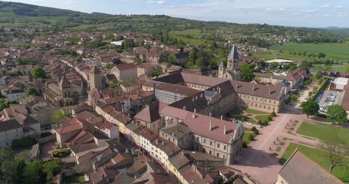 Aerial back traveling over Cluny, France