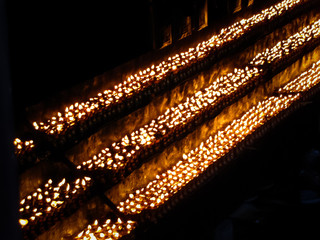 Burning candles in monastery, Tibet, China
