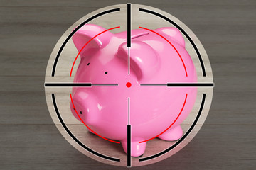 Piggybank on wooden table