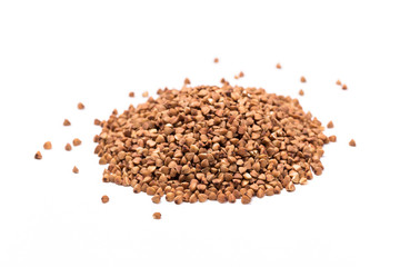 Pile of buckwheat isolated on white background. Top view.