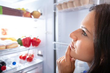 Young Woman Looking For Food