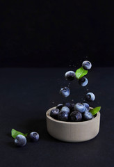 Blueberries Black background. Berries
