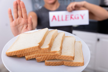 Woman Refusing Bread Slice