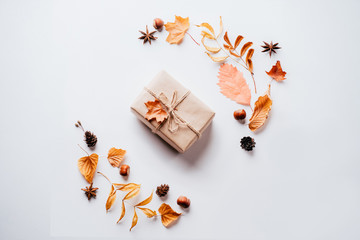 Autumn vibes, thanksgiving day present, seasonal sale concept. Fall composition, background made of...
