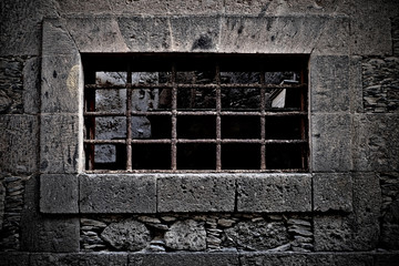 Prison old isolated window, with bars.