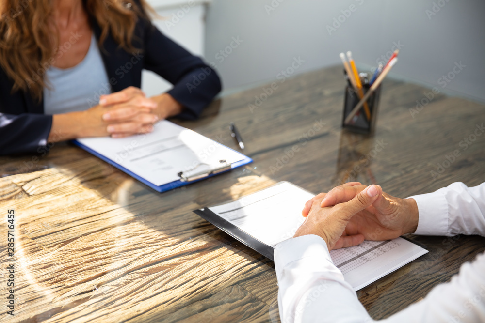 Wall mural Businessman Sitting With His Colleague