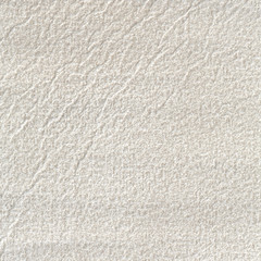 Beige paper texture, light background.