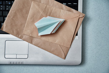 Sending e-mails and e-commerce business. Email marketing or advertising: paper airplanes, envelopes...