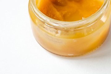 an image of jar of honey isolated on white background