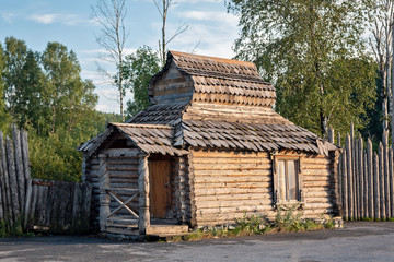 Fototapeta na wymiar a very old rare wooden log house is a good example of ancient architecture