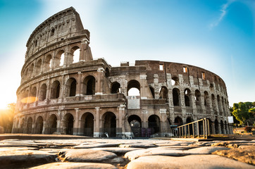 Fototapeta na wymiar Colosseum At Sunrise In Rome, Italy