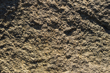 Rock plate. Colored stone surface. Wall of the house. Geology and Metamorphic rocks.