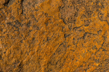 Rock plate. Colored stone surface. Wall of the house. Geology and Metamorphic rocks.